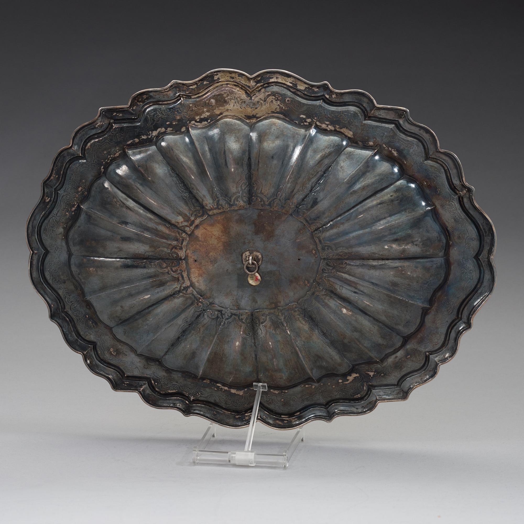 A German 18th century parcel-gilt dish, mark of Johann Gemeinhart, Nürnberg (1727-1739).