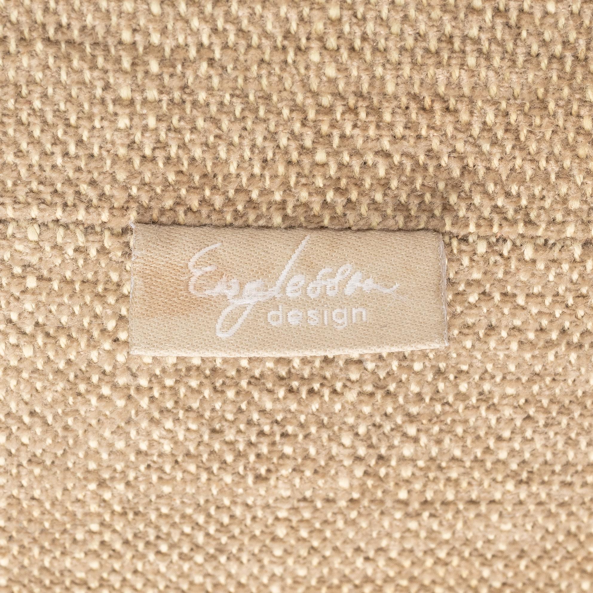 An armchair with footstool, Howard model, Englessons, 21st century.