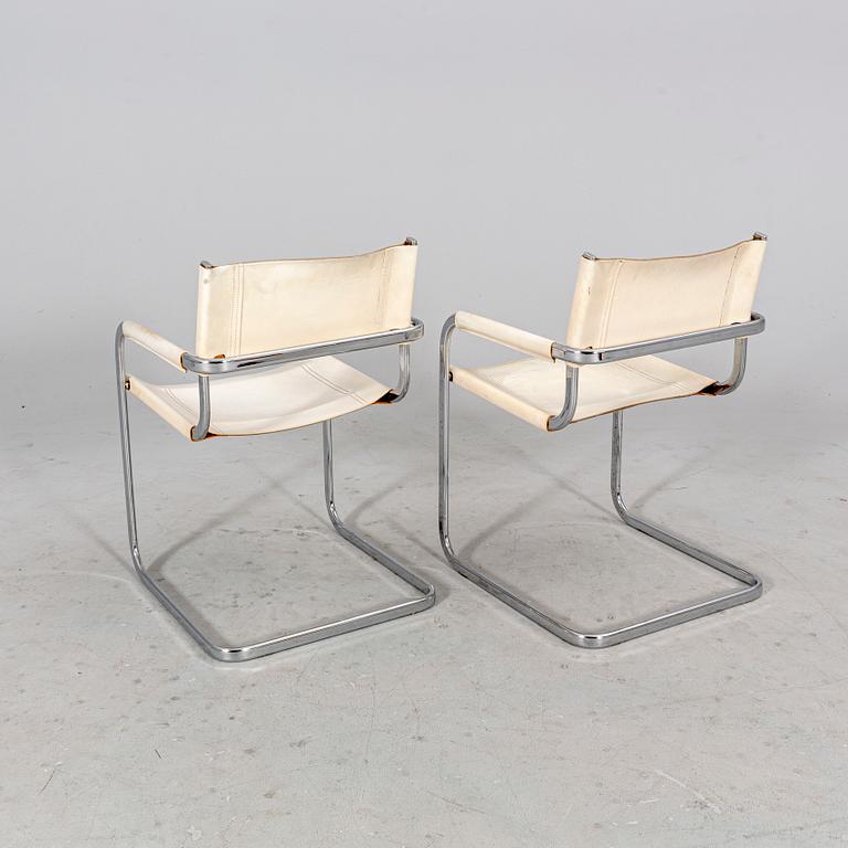 A set of four Italian chrome and leather armchairs later part of the 20th century.