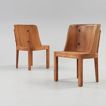 A pair of Axel Einar Hjorth stained pine armchairs, 'Lovö', Nordiska Kompaniet, 1930's.