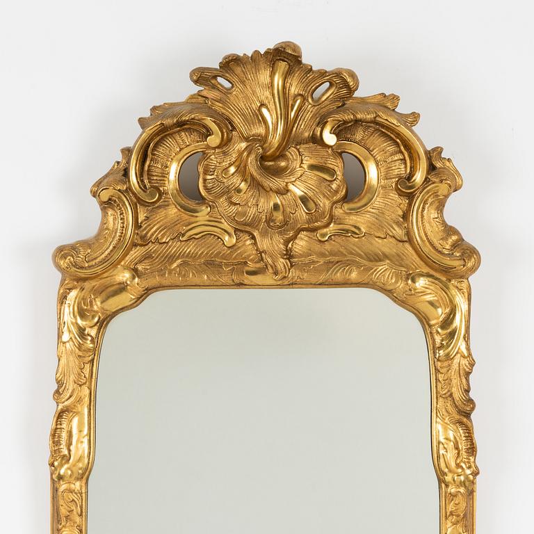 A Rococo style mirror, first half of the 20th Century.