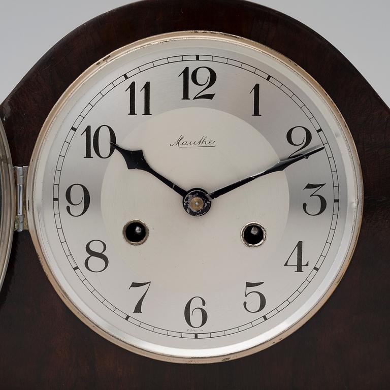 A GERMAN MANTEL CLOCK MAUTHE.