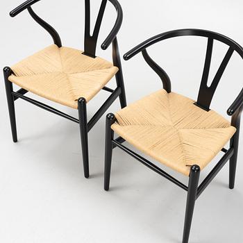 Hans J Wegner, a set of eight model CH24 armchairs, Carl Hansen, Denmark.