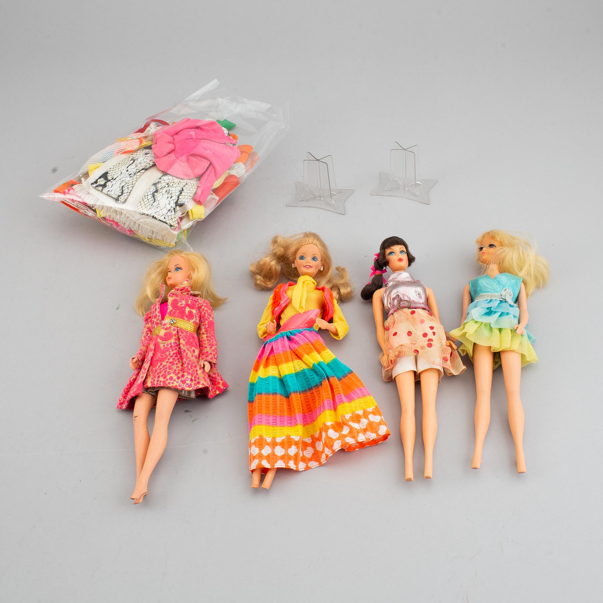 Four Barbiedolls with accessories, Mattel, 1960's-70's.