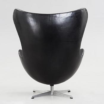 An Arne Jacobsen black leather 'Egg' chair, Fritz Hansen, Denmark 1960's.