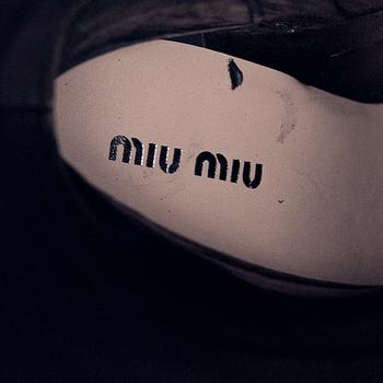 Miu Miu, a pair of black suede stiletto boots, size 36 1/2.