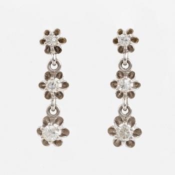 Brilliant cut diamond earrings.