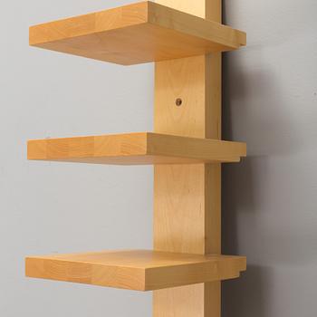 JOHN KANDELL, a "pilaster" wall shelf from the late 1900's.