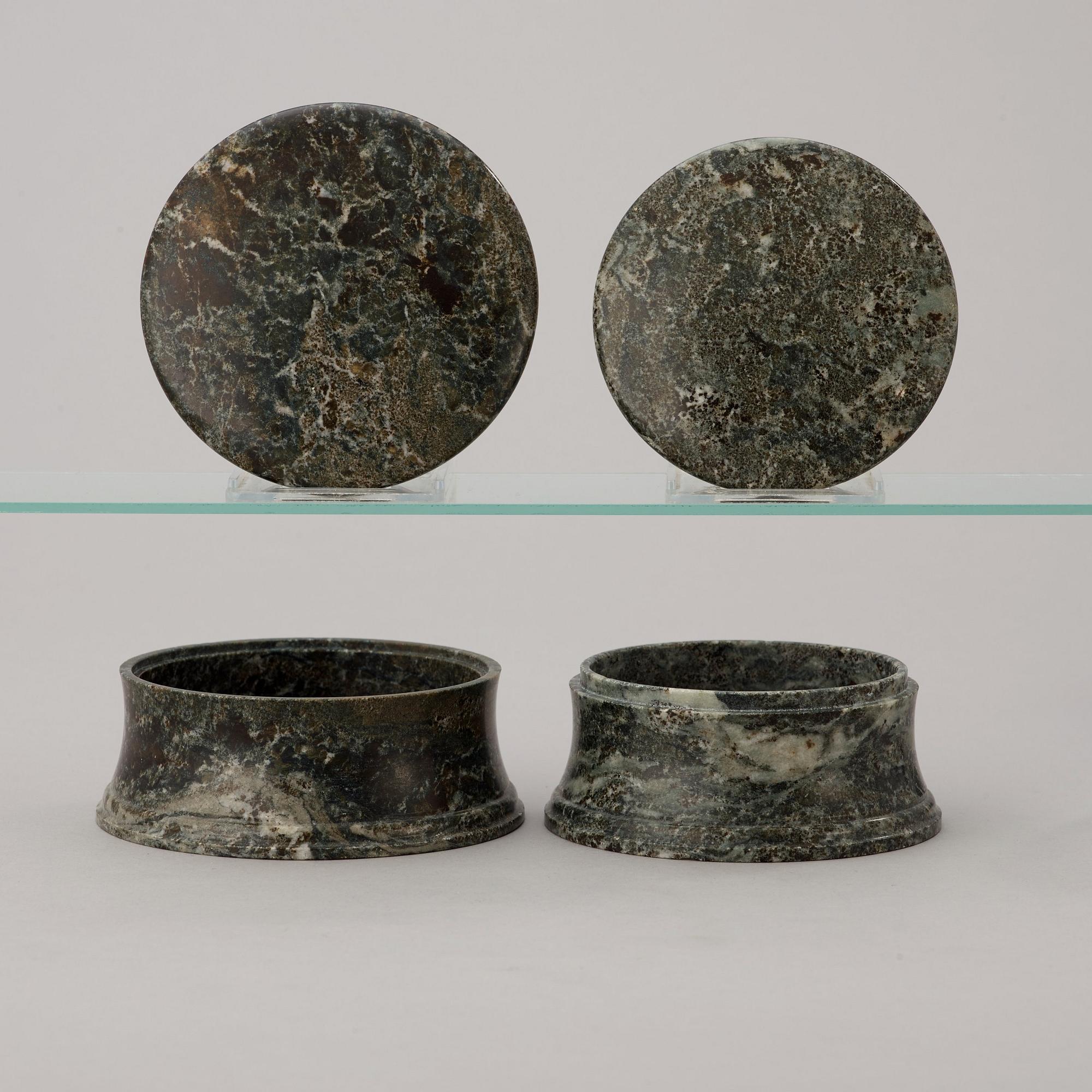 Four Swedish 19th century green marble boxes with covers.