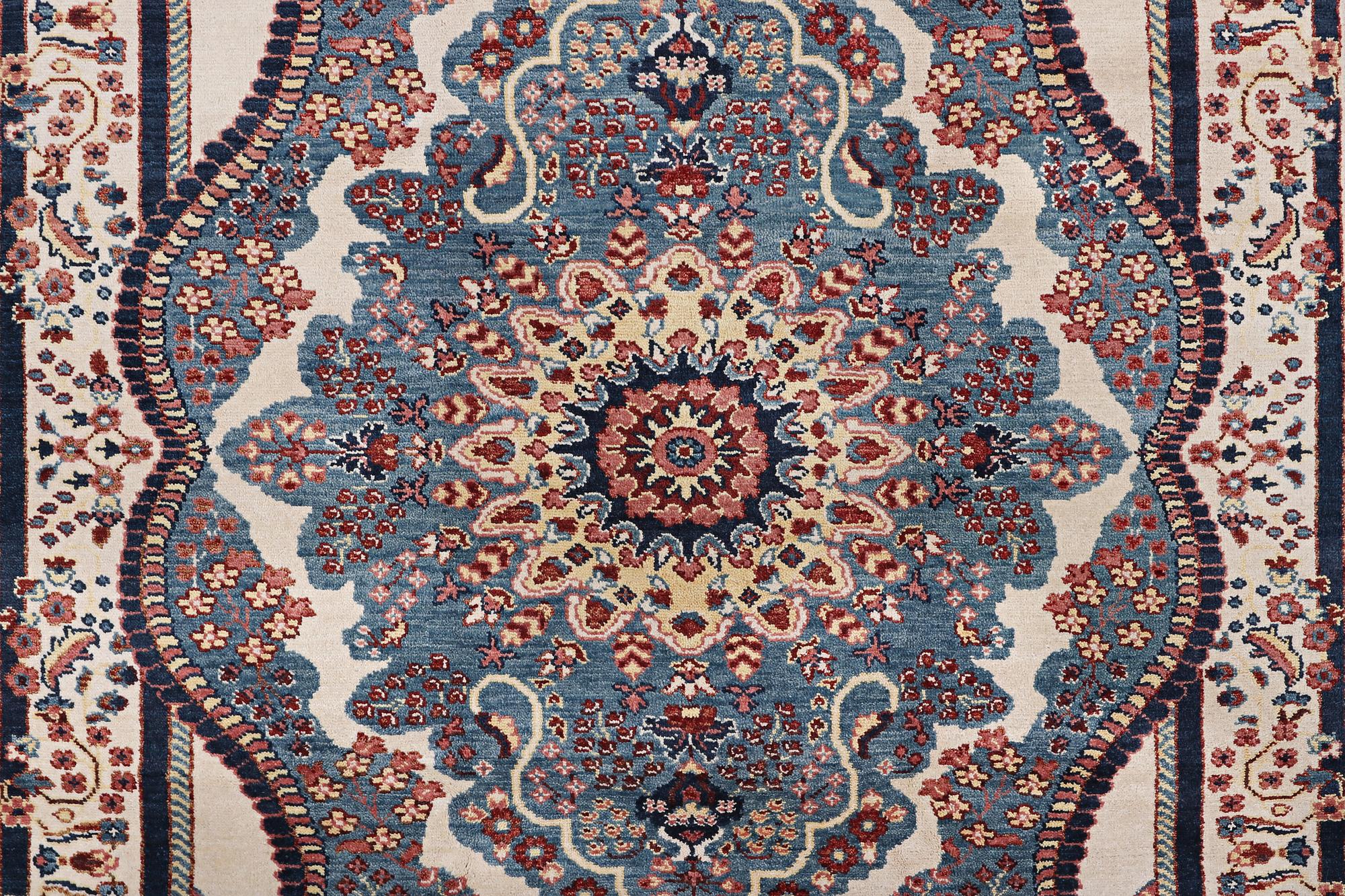 An oriental carpet with Mamluk design, c. 300 x 242 cm.