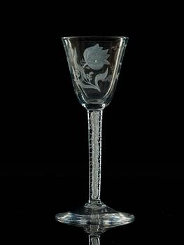 A set of four engraved lattichino glasses, England, 18th Century.