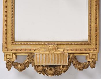 A Gustavian giltwood mirror, Stockholm, late 18th century.