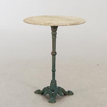 A 20th century garden table.