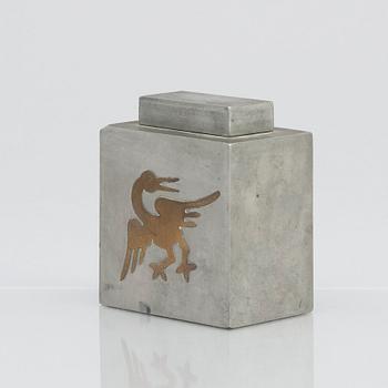 Firma Svenskt Tenn, a pewter lidded cannister with brass decor, Stockholm 1929.