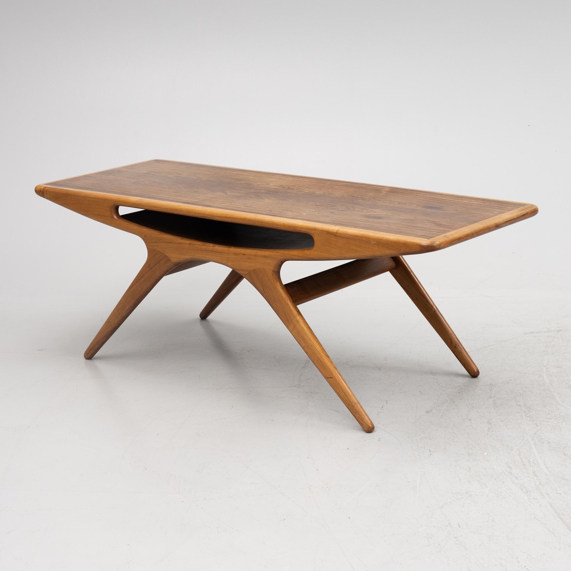 Johannes Andersen, a 'Smile' coffee table, CF Christensen, Silkeborg, Denmark, 1950's/60's.