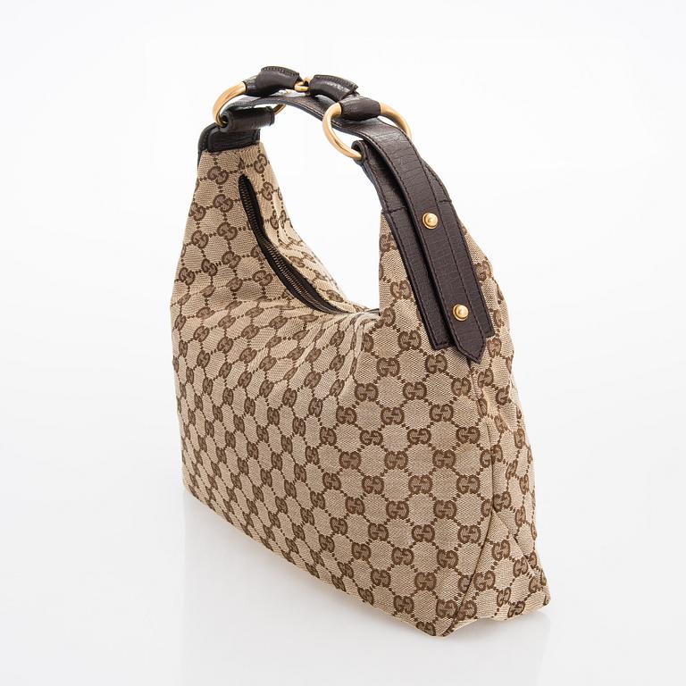 Gucci, a 'Horsebit GG Canvas Hobo Bag'.