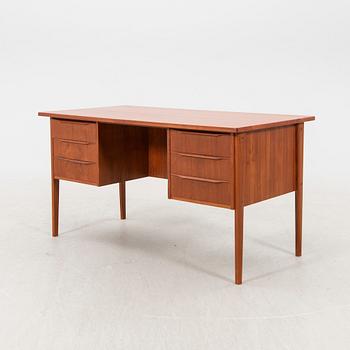 A 1950/60s teak desk.
