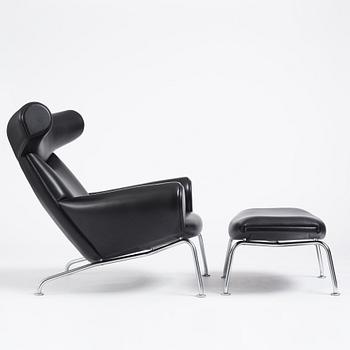 Hans J. Wegner, "Ox Chair", EJ-100, fåtölj samt fotpall, Erik Jørgensen, Danmark, efter 1961.