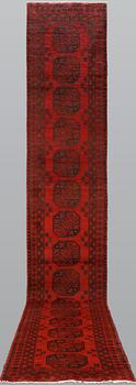 AnAfghan runner, ca 575 x 78 cm.