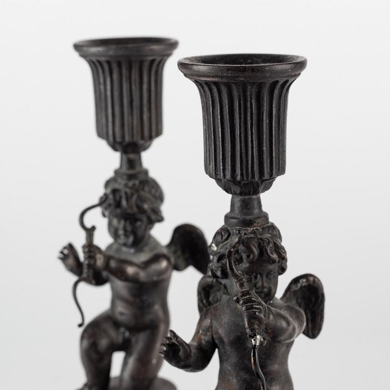 A pair of German (Berliner Eisen) Empire iron candle sticks.