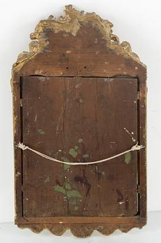 A rococo mirror, 18th century.