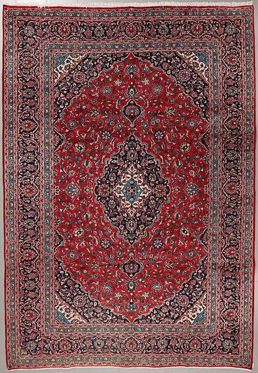 A Keshan rug, 356 x 248 cm.