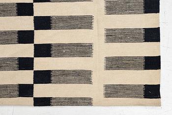 A flat-woven rug, c. 232 x 175 cm.