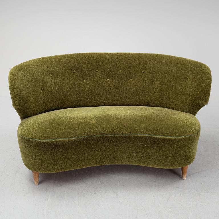 A sofa and easy chair, 1940s/50's.