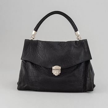 Yves Saint Laurent, a black leather bag.