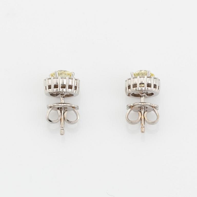 Brilliant cut diamond earrings.