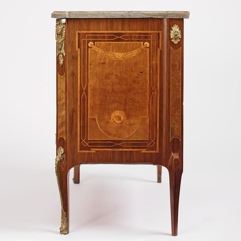 A Gustavian marquetry, ormolu-mounted and limestone-top commode by Georg Haupt (master in Stockholm 1770-84).