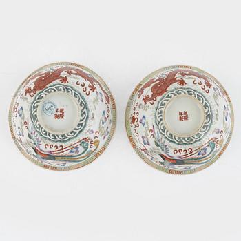 A pair of dragon and phoenix bowls, China, Republic with Qianlong mark.