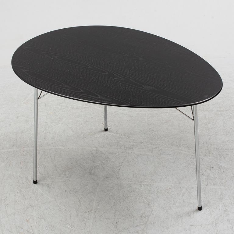 An Arne Jacobsen "Centenary Package" comprising three "Ant Chairs" and an eggshaped table, Fritz Hansen, Denmark.