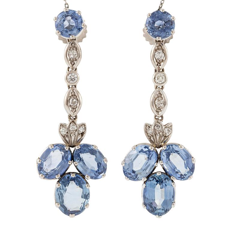 A pair of earrings with sapphires and diamonds, stamped Carlman.