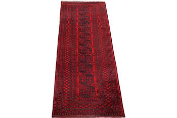 A runner carpet, Afghan, c. 380 x 94 cm.