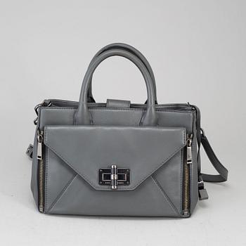DIANE VON FÜRSTEBERG, a grey leather 'DVF Secret Agent' bag.
