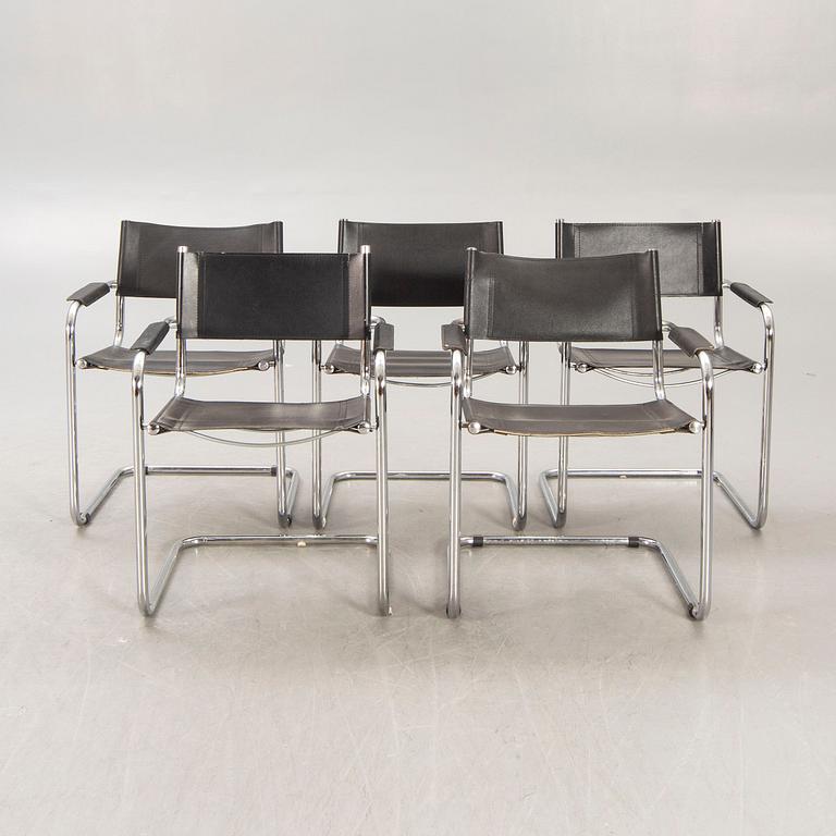 A set of five similar Italian 1970s chrome and leather armchairs.