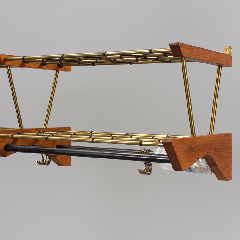 HATTHYLLA, mässing och teak, omkring 1900-talets mitt.
