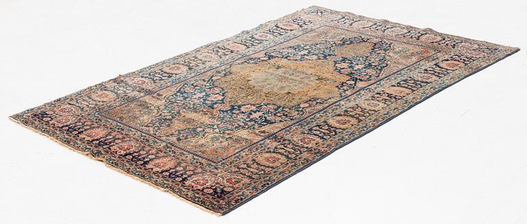 An antique Kashan 'Mohtasham' rug, c. 206 x 131 cm.