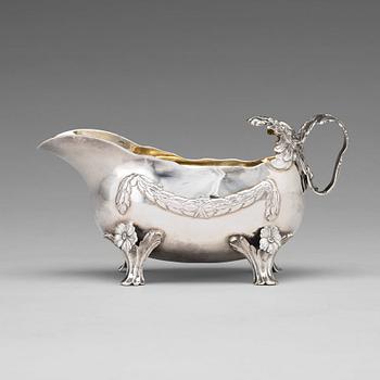 131. A Swedish 18th century parcel-gilt silver cream-jug, marks of Lars Boye Stockholm 1772.