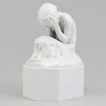 A white glazed Royal Copenhagen figure of a faun, Gerhard Henning, Denmark, early 20th Century.