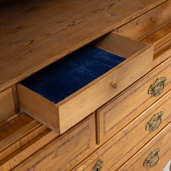 An oak veneered rococo cabinet, mid 18th Century.