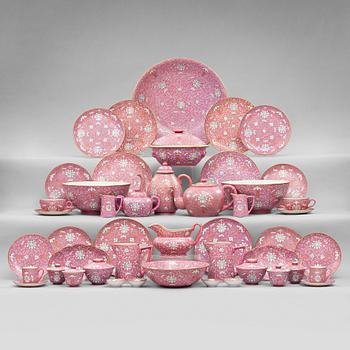 A pink ground Lotus service, China, early 20th Century. (137 pieces).