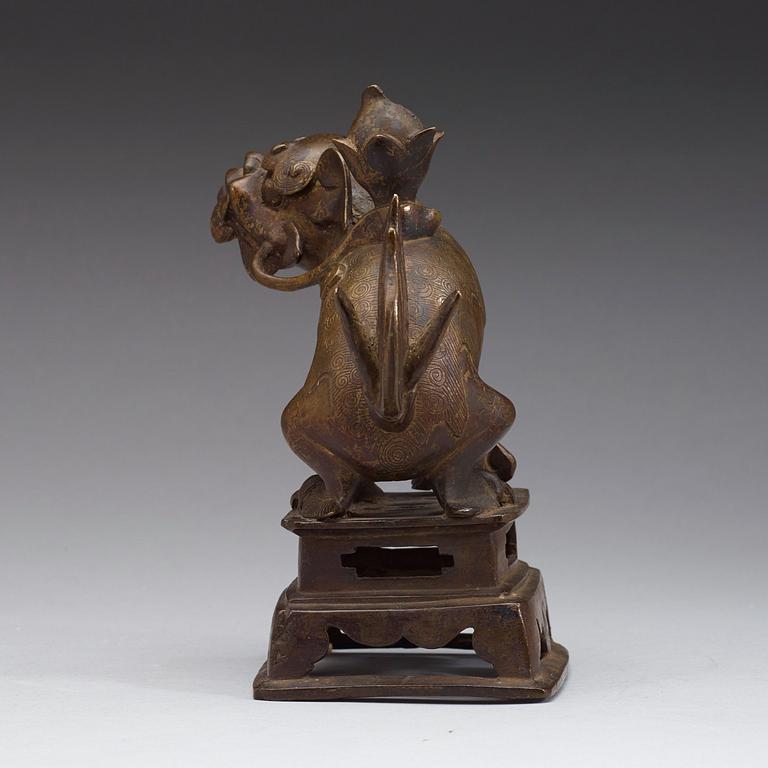 A bronze figurine of a mythological animal, presumably Ming dynasty (1368-1643).
