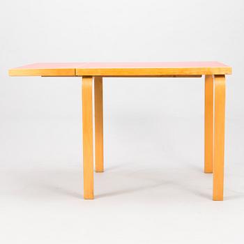 A mid-20th century drop leaf table for Artek Finland.