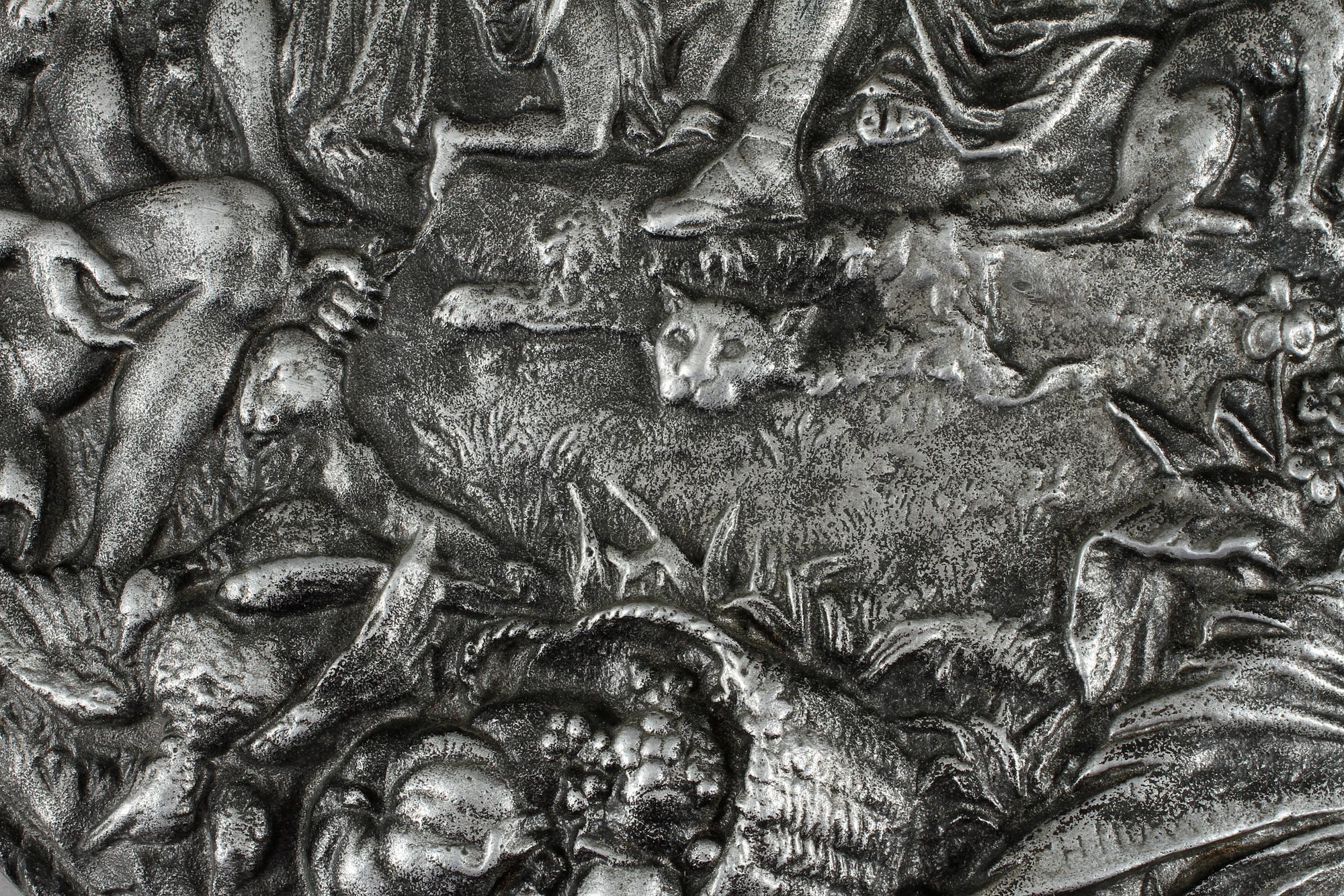 DEKORSKÖLD, metall, efter C H Norrström, 1900-talets andra hälft.