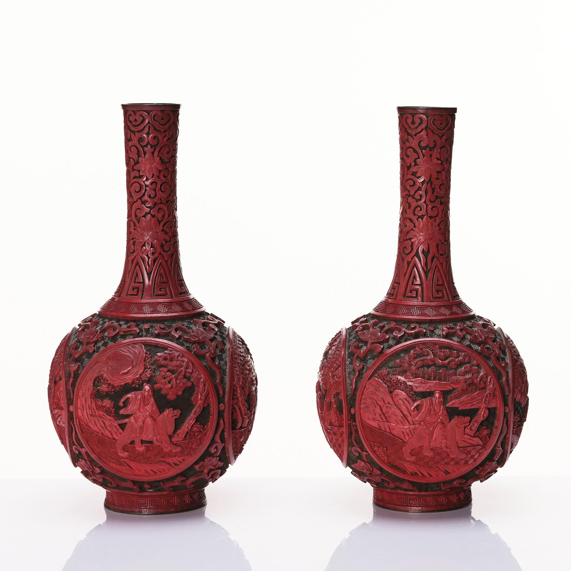 A pair of red lacquer vases, Qing dynasty (1644-1912).