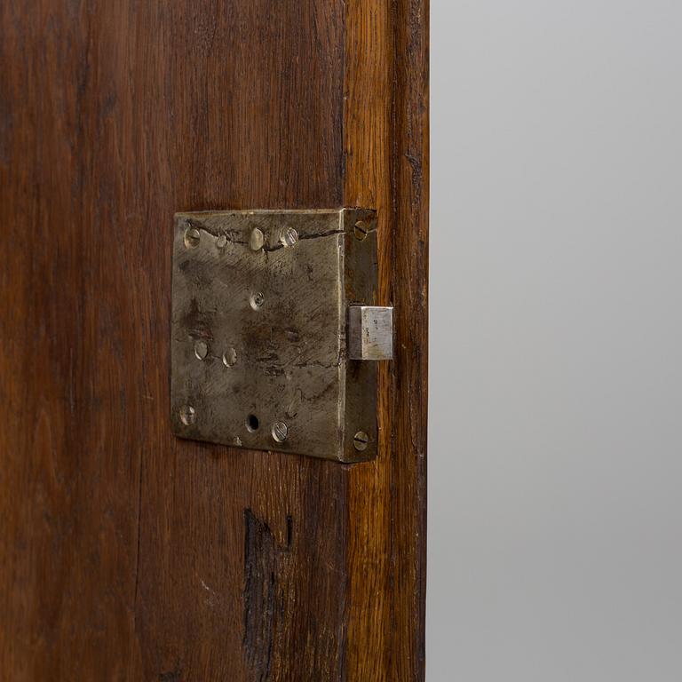 A 18th century oak rococo cabinet.