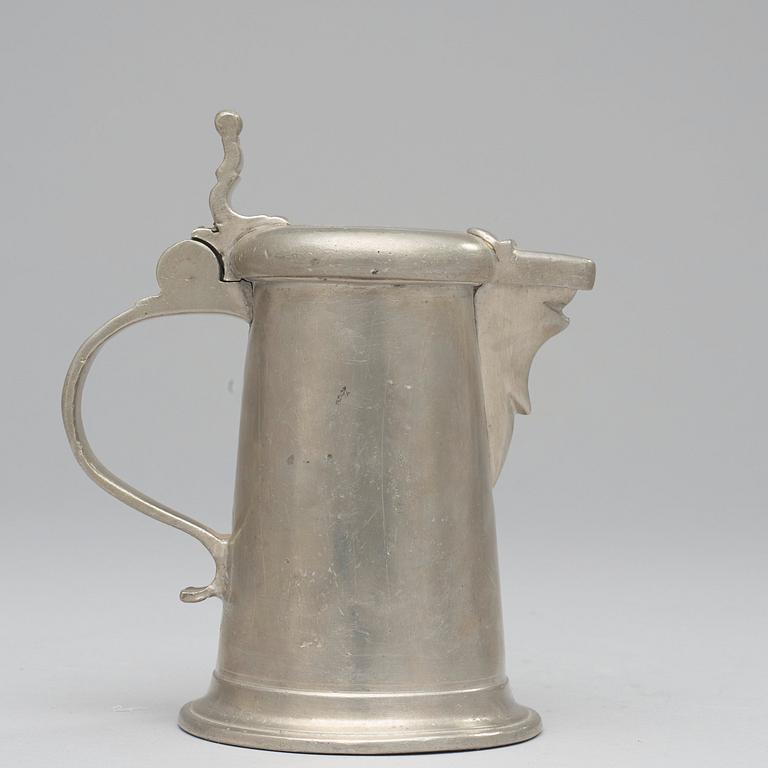 A pewter jug by J Ch Pohlitz 1727.