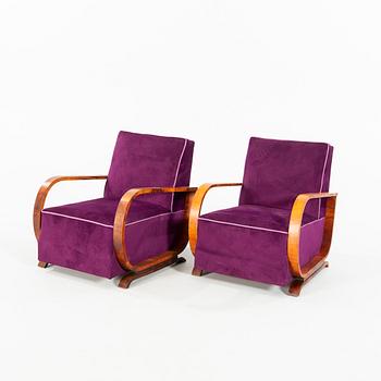 A pair of Art Deco easy chairs from the first half of the 20th century.